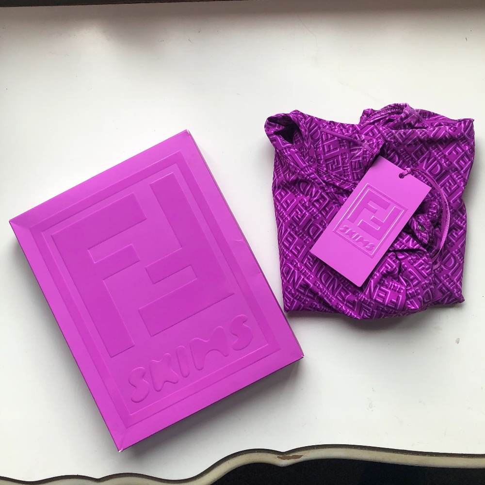 Purple FENDI X SKIMS bodysuit.